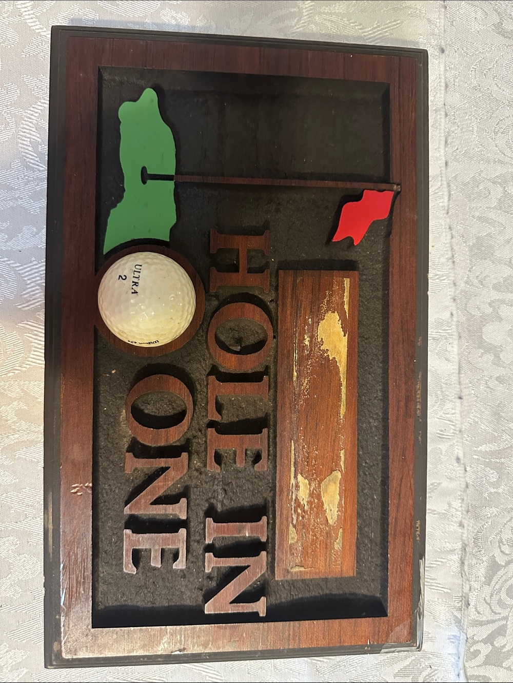 Home Wall Decor "Hole In One" Plaque in Brown with Green and Red Accents